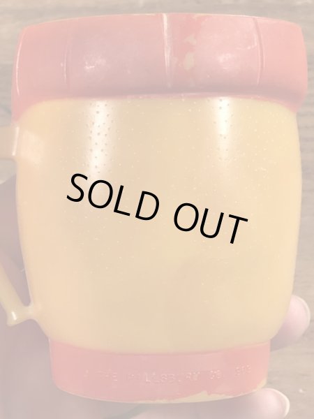 企業キャラクターのファニーフェイスのビンテージのマグカップ