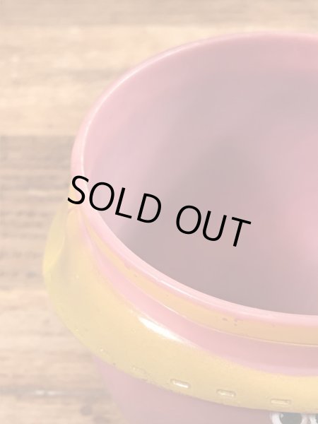 企業キャラクターのファニーフェイスのヴィンテージのおもちゃ