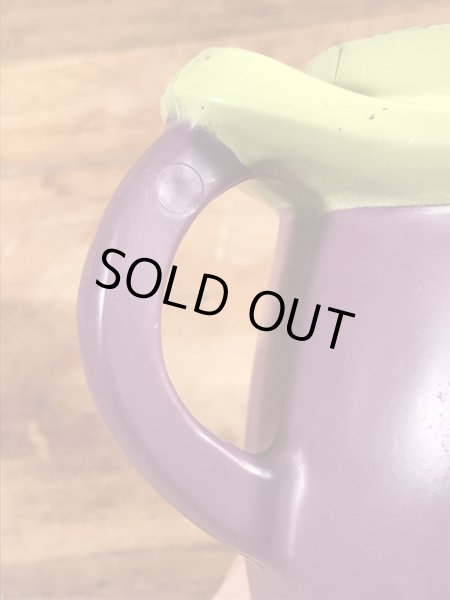 ファニーフェイスのグーフィーグレープのビンテージのマグカップ