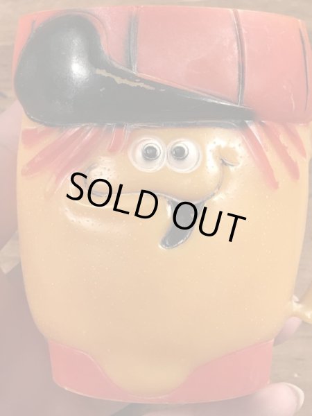 企業キャラクターのファニーフェイスのビンテージのマグカップ