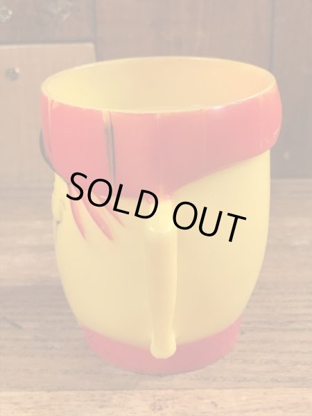 企業キャラクターのファニーフェイスのビンテージのマグカップ