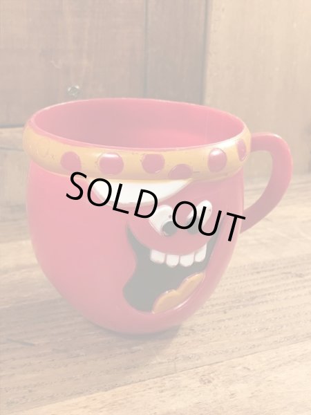 アドバタイジングキャラクターのファニーフェイスのビンテージのマグカップ