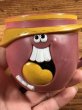 アドバタイジングキャラクターのファニーフェイスのビンテージのマグカップ