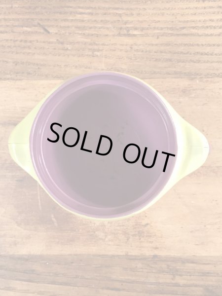 ファニーフェイスのグーフィーグレープのビンテージのマグカップ