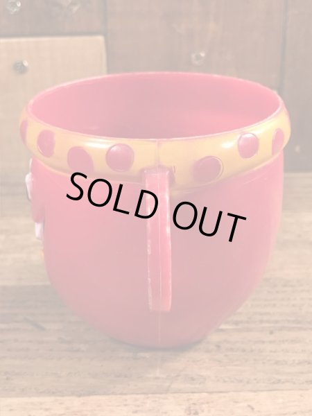 アドバタイジングキャラクターのファニーフェイスのビンテージのマグカップ