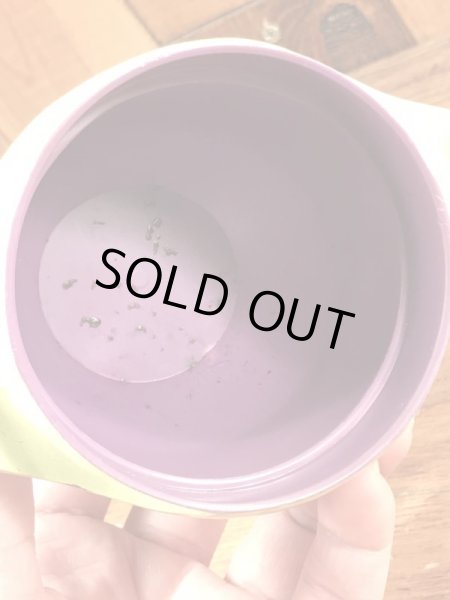 ファニーフェイスのグーフィーグレープのビンテージのマグカップ