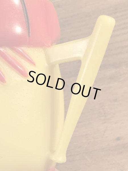 企業キャラクターのファニーフェイスのビンテージのマグカップ