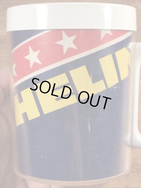 企業キャラクターのミシュランマンのビンテージのマグカップ