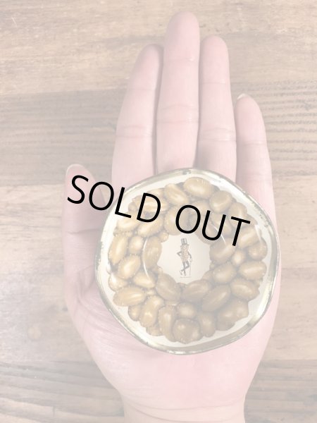 アドバタイジングキャラクターのミスターピーナッツのビンテージのTin容器