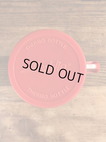 アドバタイジングキャラクターのミスタージップのビンテージの水筒