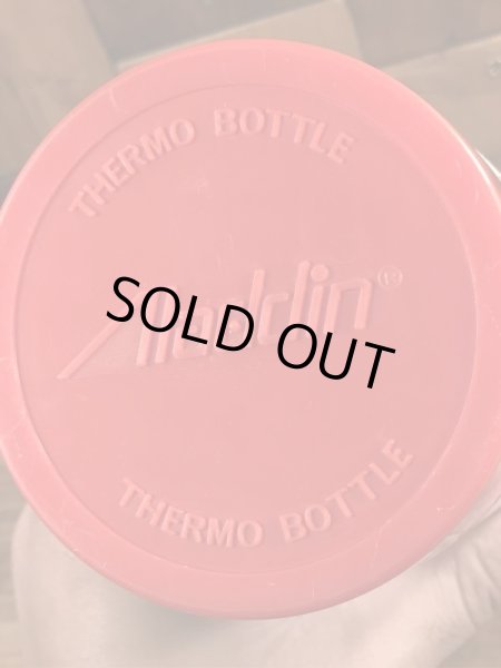 アドバタイジングキャラクターのミスタージップのビンテージの水筒