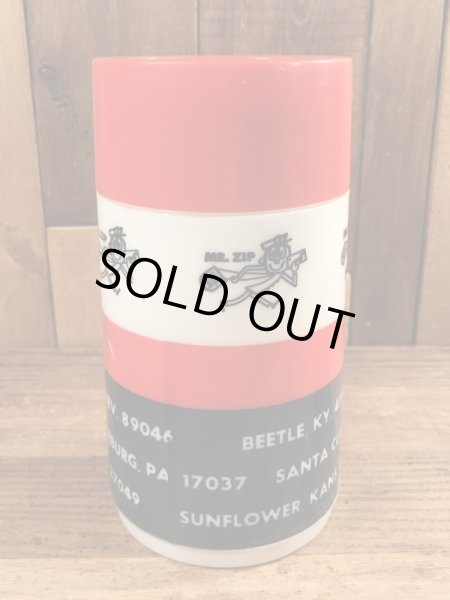 アドバタイジングキャラクターのミスタージップのビンテージの水筒