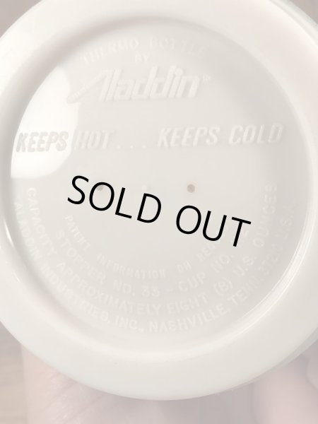 企業キャラクターのMr. Zipのヴィンテージのサーモボトル