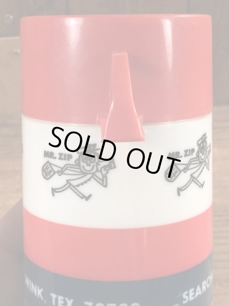 アドバタイジングキャラクターのミスタージップのビンテージの水筒