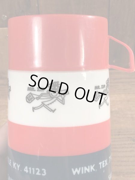 アドバタイジングキャラクターのミスタージップのビンテージの水筒