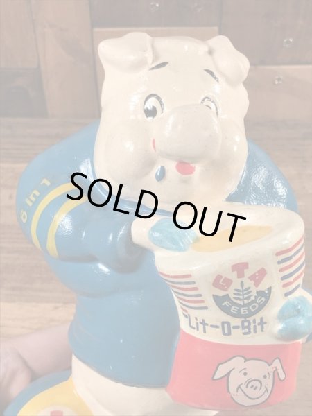 企業キャラクターのアーニーピッグのビンテージの貯金箱フィギュア