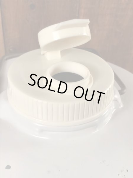 企業キャラクターのエッソオイルのヴィンテージの水筒