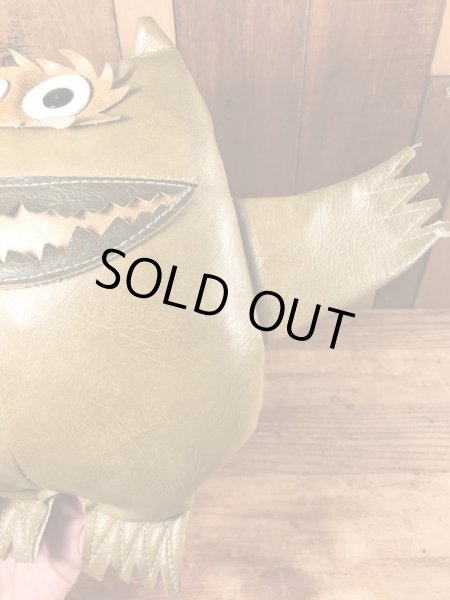 企業キャラクターのナウガモンスターのヴィンテージのトイ