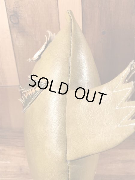 企業キャラクターのナウガモンスターのヴィンテージのトイ