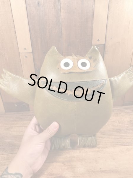 企業キャラクターのナウガモンスターのヴィンテージのトイ