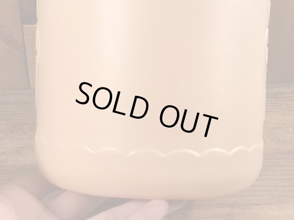 企業キャラクターのハッピージャックスのビンテージのクッキーコンテナー