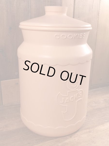 企業キャラクターのハッピージャックスのビンテージのクッキーコンテナー