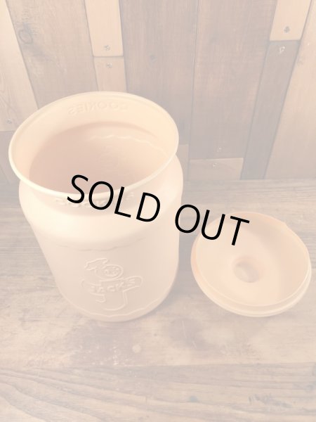 企業キャラクターのハッピージャックスのビンテージのクッキーコンテナー