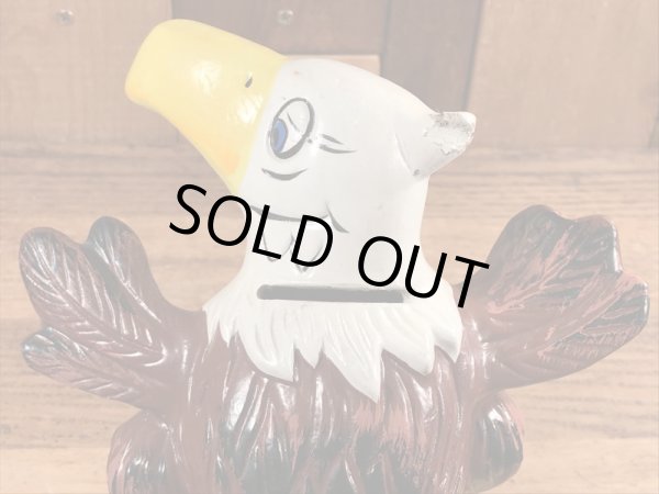 ブッシュガーデンのアドバタイジングキャラクターのビンテージのコインバンクドール