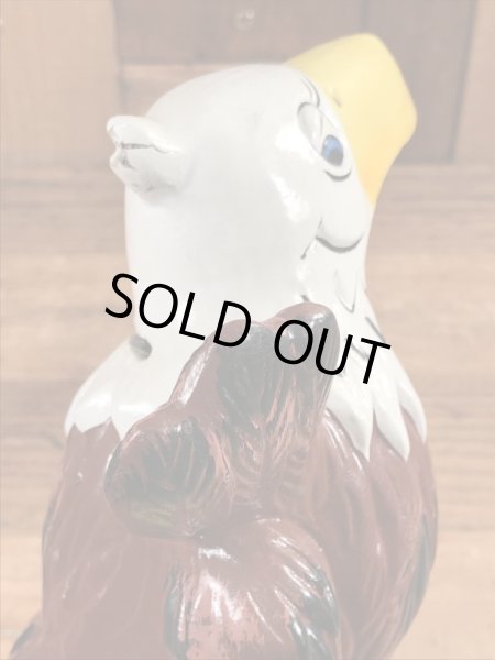 ブッシュガーデンのアドバタイジングキャラクターのビンテージのコインバンクドール