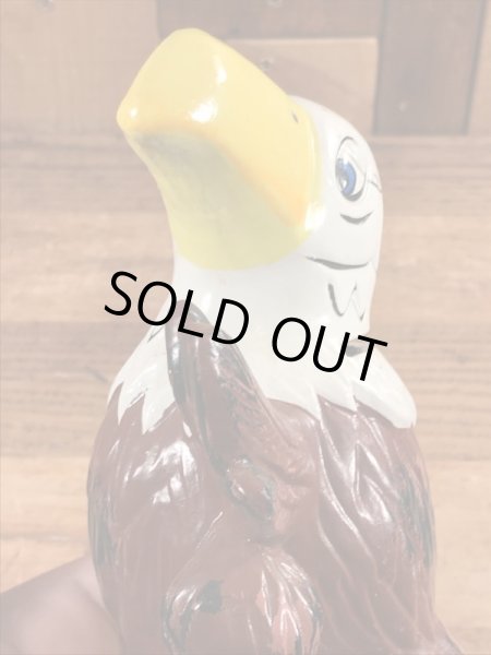 ブッシュガーデンのアドバタイジングキャラクターのビンテージのコインバンクドール