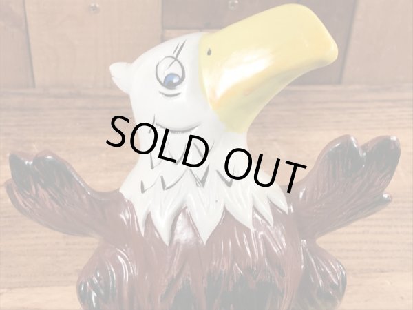 ブッシュガーデンのアドバタイジングキャラクターのビンテージのコインバンクドール