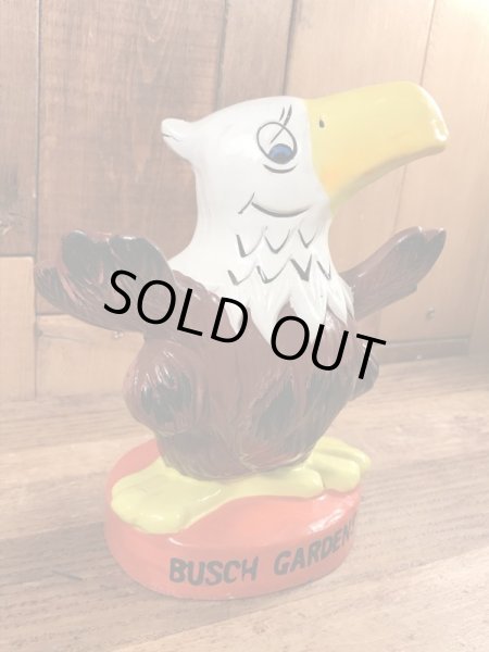 ブッシュガーデンのアドバタイジングキャラクターのビンテージのコインバンクドール