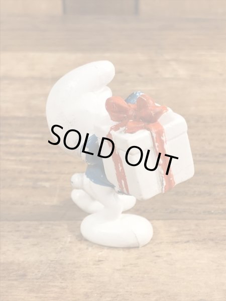 70年代頃のプレゼントを持ったスマーフのビンテージのPVCフィギュア