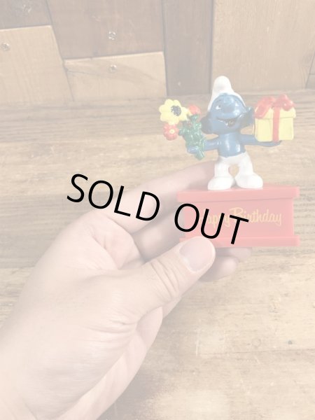 70’sのプレゼントを持ったスマーフのヴィンテージの台座付きPVC製フィギュア