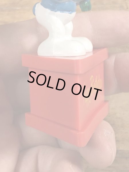 70’sのプレゼントを持ったスマーフのヴィンテージの台座付きPVC製フィギュア