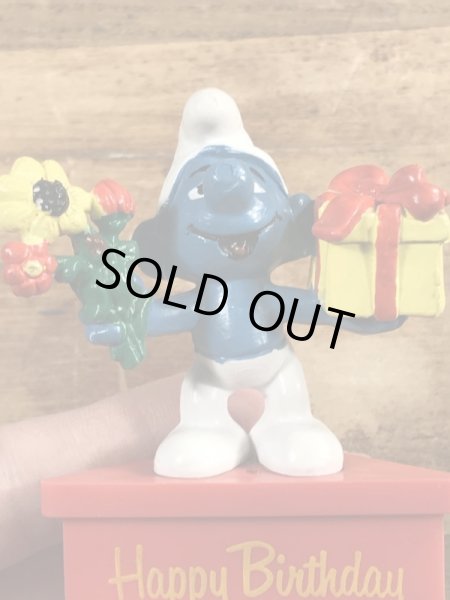 70年代頃のプレゼントを持ったスマーフのビンテージのPVCフィギュア