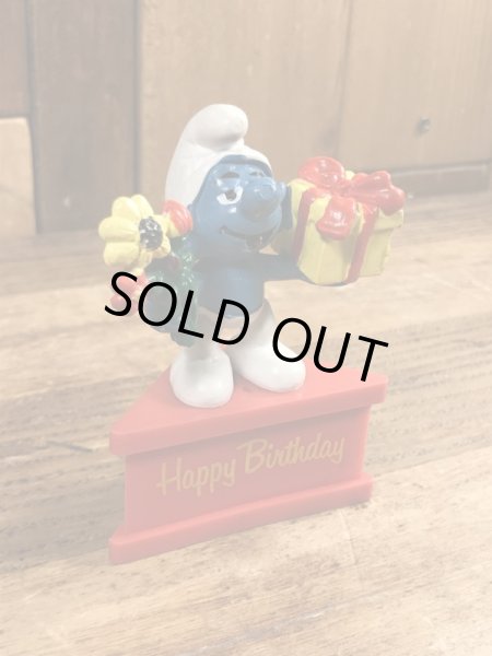 70年代頃のプレゼントを持ったスマーフのビンテージのPVCフィギュア