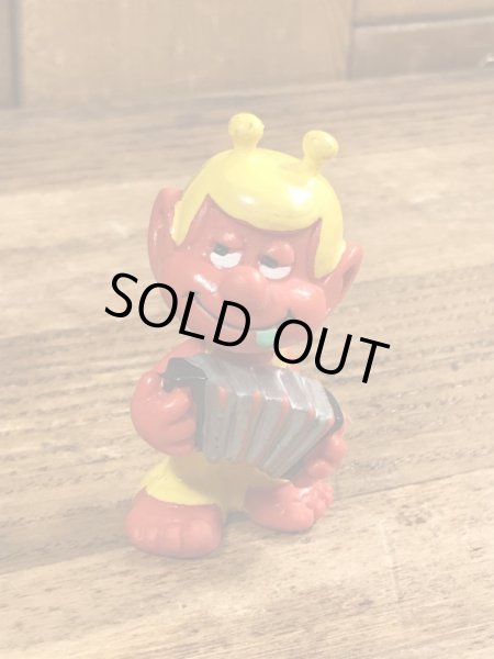 80年代頃のアコーディオンを弾いているアストロスニックのビンテージのPVCフィギュア