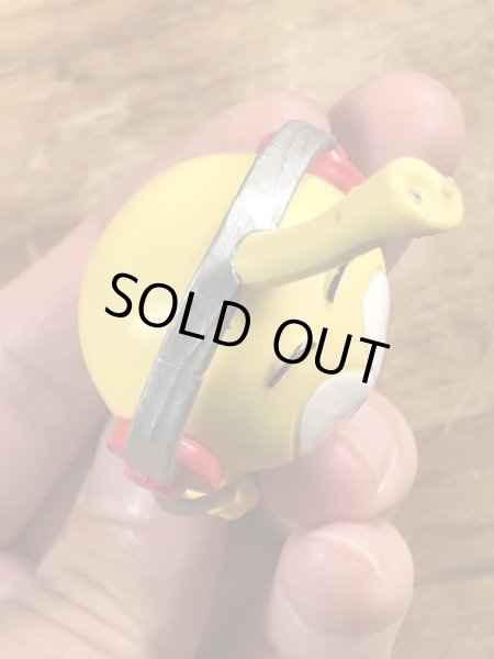 80年代頃の音楽を聴いているスノークスのビンテージのPVCフィギュア