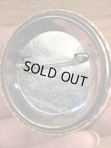 80年代頃のヒットマンと書かれたビンテージの缶バッジ