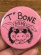 80年代頃のBite Meのブタが描かれたビンテージの缶バッジ