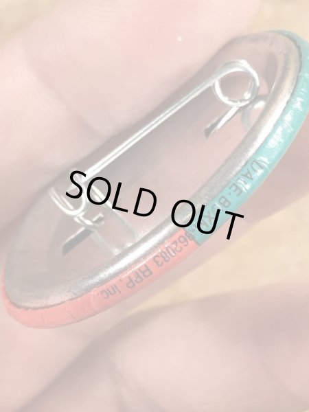 80’sのWhat's So Goddamned Terrific About...のメッセージが書かれたヴィンテージの缶バッチ