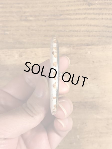 80年代頃のヒットマンと書かれたビンテージの缶バッジ