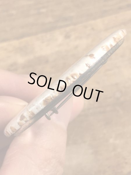 80年代頃のヒットマンと書かれたビンテージの缶バッジ