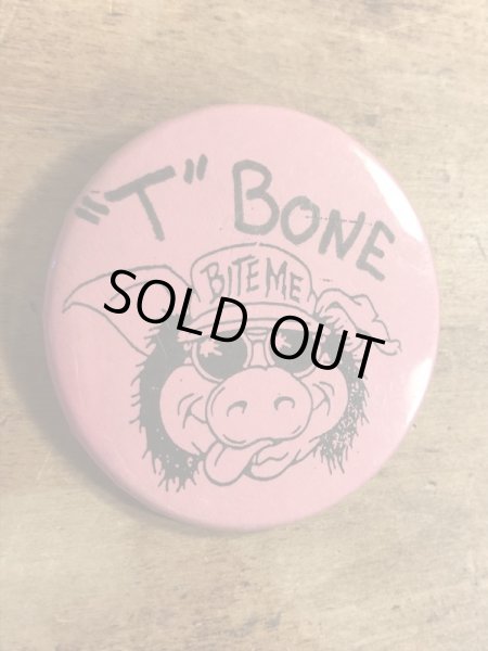 80年代頃のBite Meのブタが描かれたビンテージの缶バッジ