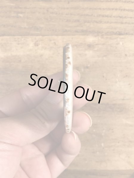 80年代頃のヒットマンと書かれたビンテージの缶バッジ