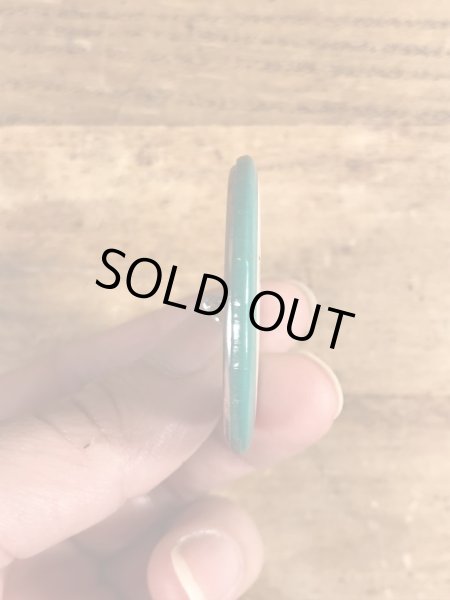 80年代頃のWhat's So Goddamned Terrific About...のメッセージが書かれたビンテージの缶バッジ