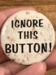 60年代頃のIgnore This Button!のメッセージが書かれたビンテージの缶バッチ