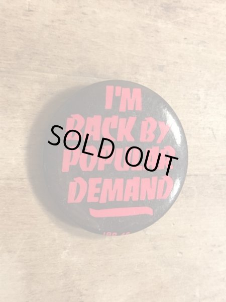 80年代頃のI'm Back By Popular Demandのメッセージが書かれたビンテージの缶バッジ