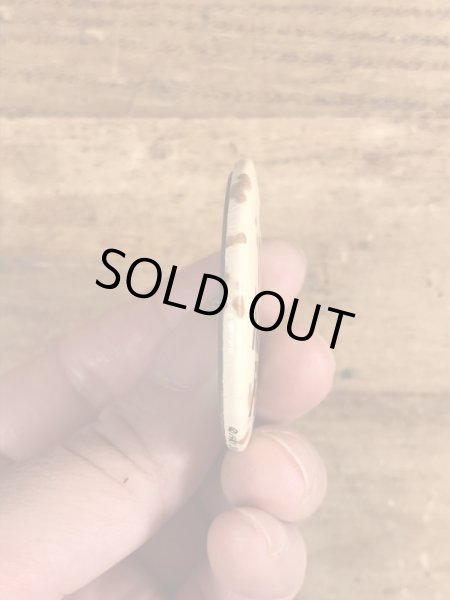 80年代頃のSit On A Happy Faceのメッセージが書かれたビンテージの缶バッジ